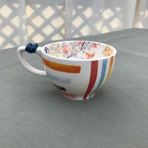 Pretty tea cup. Multicolored stripes & flowers
